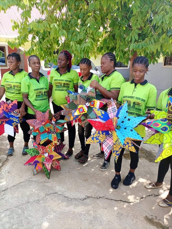 Children holding crafts